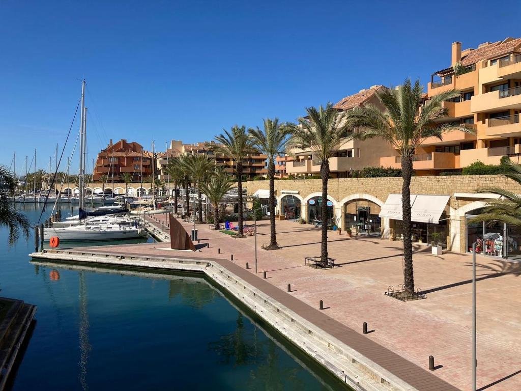 Sotogrande Marina with moored yachts and waterfront apartments